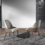 Dining chair upholstered in eco-leather with ash wood legs