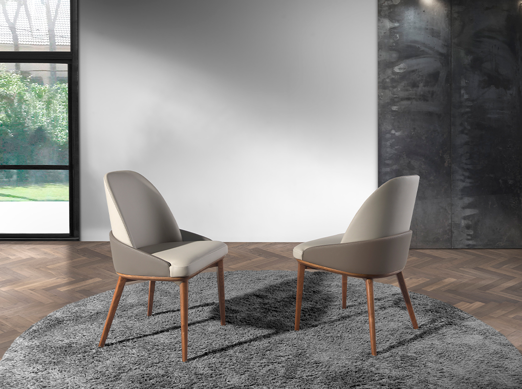 Dining chair upholstered in eco-leather with ash wood legs