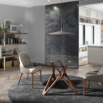 Dining chair upholstered in eco-leather with ash wood legs