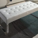 Upholstered bench in leatherette and chrome steel