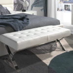 Upholstered bench in leatherette and chrome steel