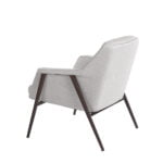 Armchair upholstered in fabric and brown steel legs