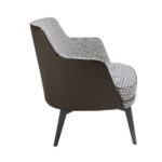 Armchair upholstered in houndstooth fabric