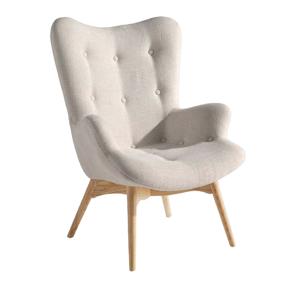 Armchair upholstered in tufted fabric