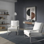 Upholstered armchair with stainless steel frame