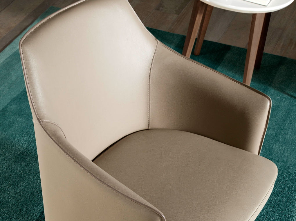 Swivel armchair upholstered in leatherette Swivel armchair upholstered in leatherette