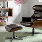 Swivel relax armchair upholstered in leather