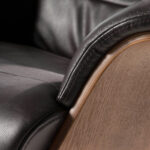 Swivel relax armchair upholstered in leather