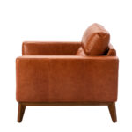 Armchair upholstered in leather and Walnut wood legs