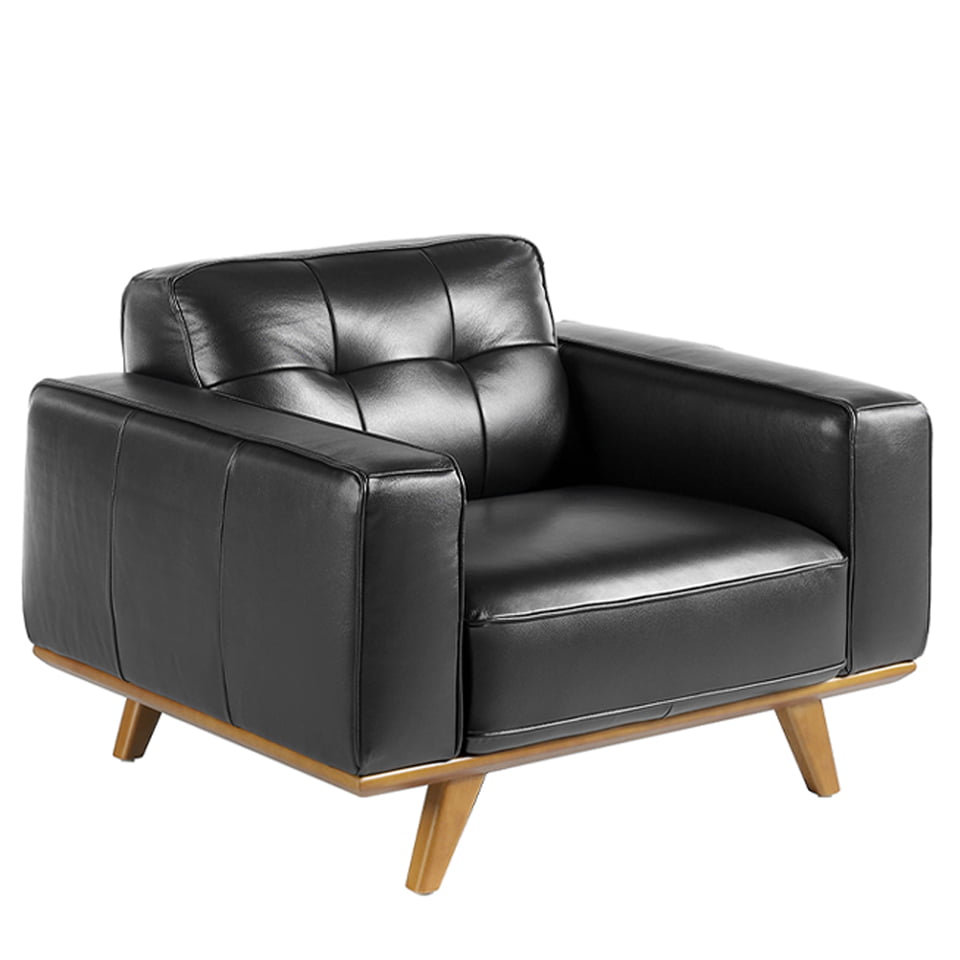 Armchair upholstered in leather and Walnut wood legs