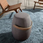 Puff upholstered in gray fabric