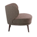 Armchair upholstered in fabric and brown steel legs