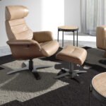 Relax swivel armchair upholstered in sand leather