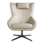 Sillón giratorio con cojín tapizado en piel