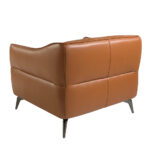 Leather upholstered capitonné armchair