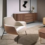 Fabric and eco-leather upholstered armchair with black steel legs