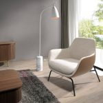 Fabric and eco-leather upholstered armchair with black steel legs