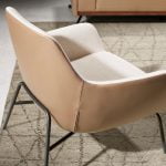 Fabric and eco-leather upholstered armchair with black steel legs