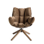 Brown velvet swivel armchair