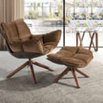 Brown velvet swivel armchair