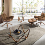 Brown velvet swivel armchair