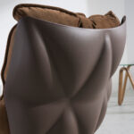 Brown velvet swivel armchair