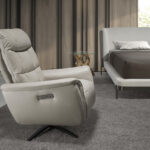 Grey leather swivel armchair