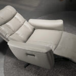 Grey leather swivel armchair