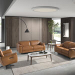 Brown leather swivel armchair