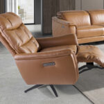 Brown leather swivel armchair