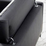 2-seater sofa upholstered in leather with black steel legs