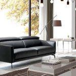 3-seater sofa upholstered in leather with black steel legs