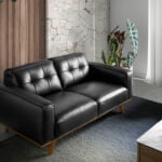 2-seater sofa upholstered in tufted leather