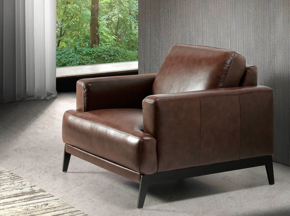 Upholstered leather armchair with steel legs painted in black Upholstered leather armchair with steel legs painted in black