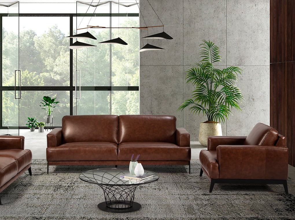 Upholstered leather armchair with steel legs painted in black Upholstered leather armchair with steel legs painted in black