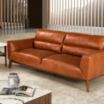 2-seater sofa upholstered in leather with Walnut wood legs