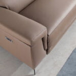 3-seater sofa upholstered in leather with black steel legs