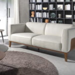 3 seater sofa upholstered in leather with walnut wood structure