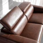 3 seater leather upholstered sofa with relax mechanism