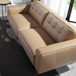 2 seater sofa upholstered in capitoné leather