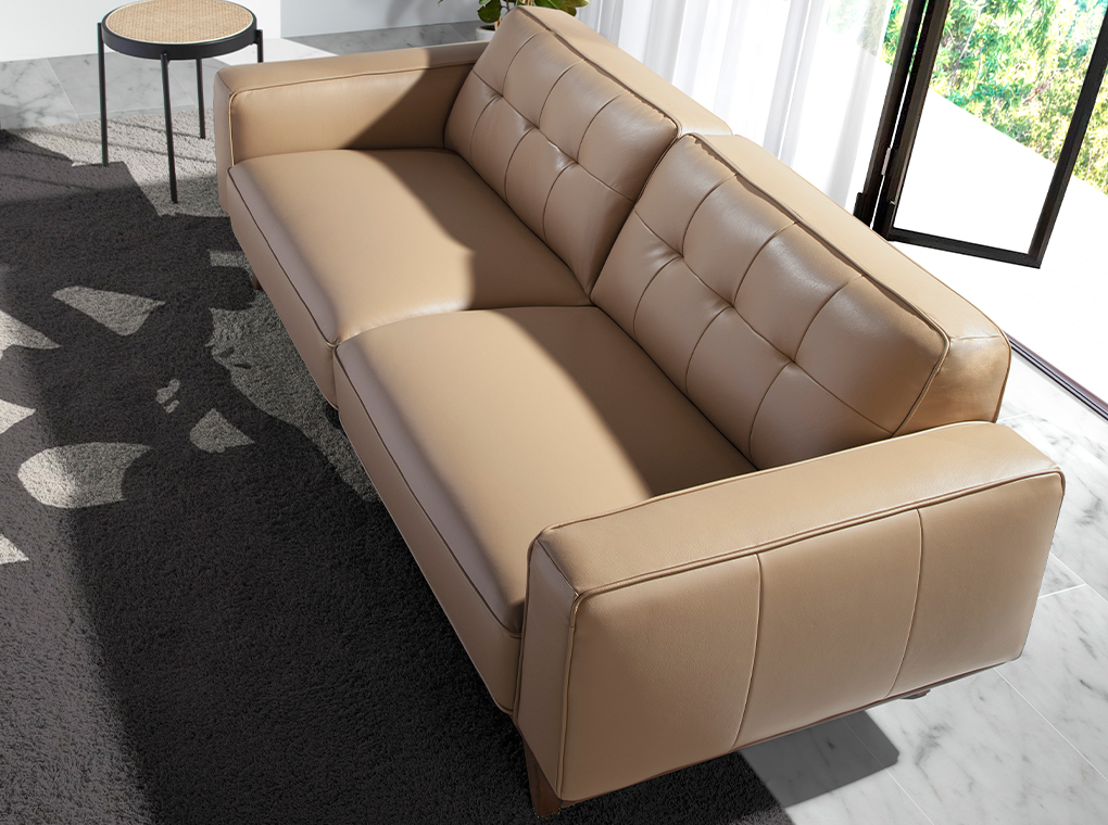 3 seater sofa upholstered in capitonné leather