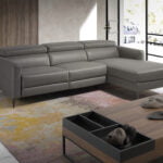 Chaise longue sofa upholstered in leather with electric relax mechanism