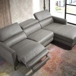 Chaise longue sofa upholstered in leather with electric relax mechanism