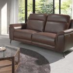 3 seater sofa upholstered in leather with electric relax mechanism