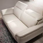 2 seater sofa upholstered in taupe grey leather with black steel legs