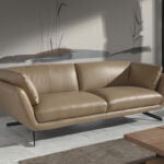 3 seater sofa upholstered in leather and black steel legs