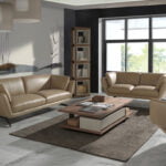 3 seater sofa upholstered in leather and black steel legs