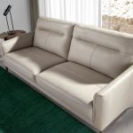 3 seater sofa upholstered in taupe grey leather with black steel legs