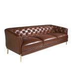 3 seater sofa upholstered in leather with golden polished steel legs