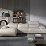 Leather upholstered chaise longue sofa with articulated backrests